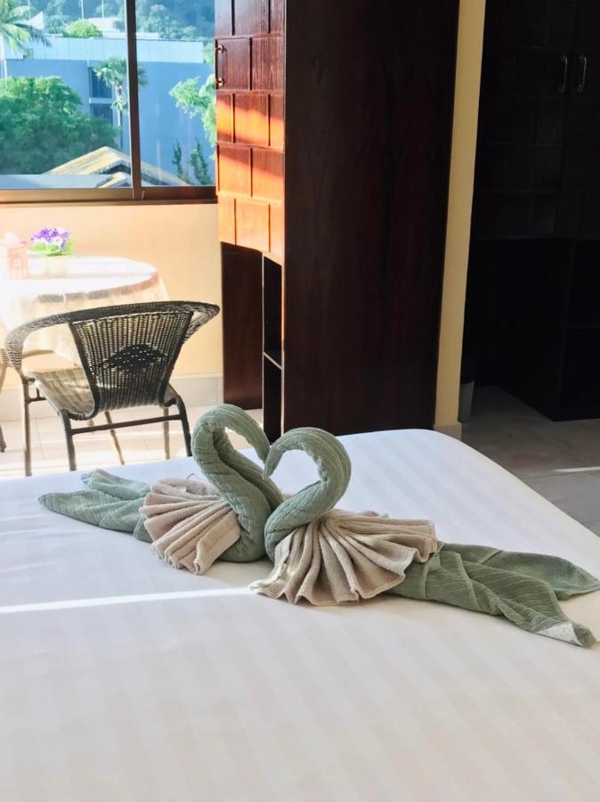 Happy Holidays Hotel Patong Exterior photo